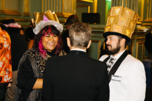 Photo of Attendees in Fun Hats at the 2023 Beaux Arts Ball